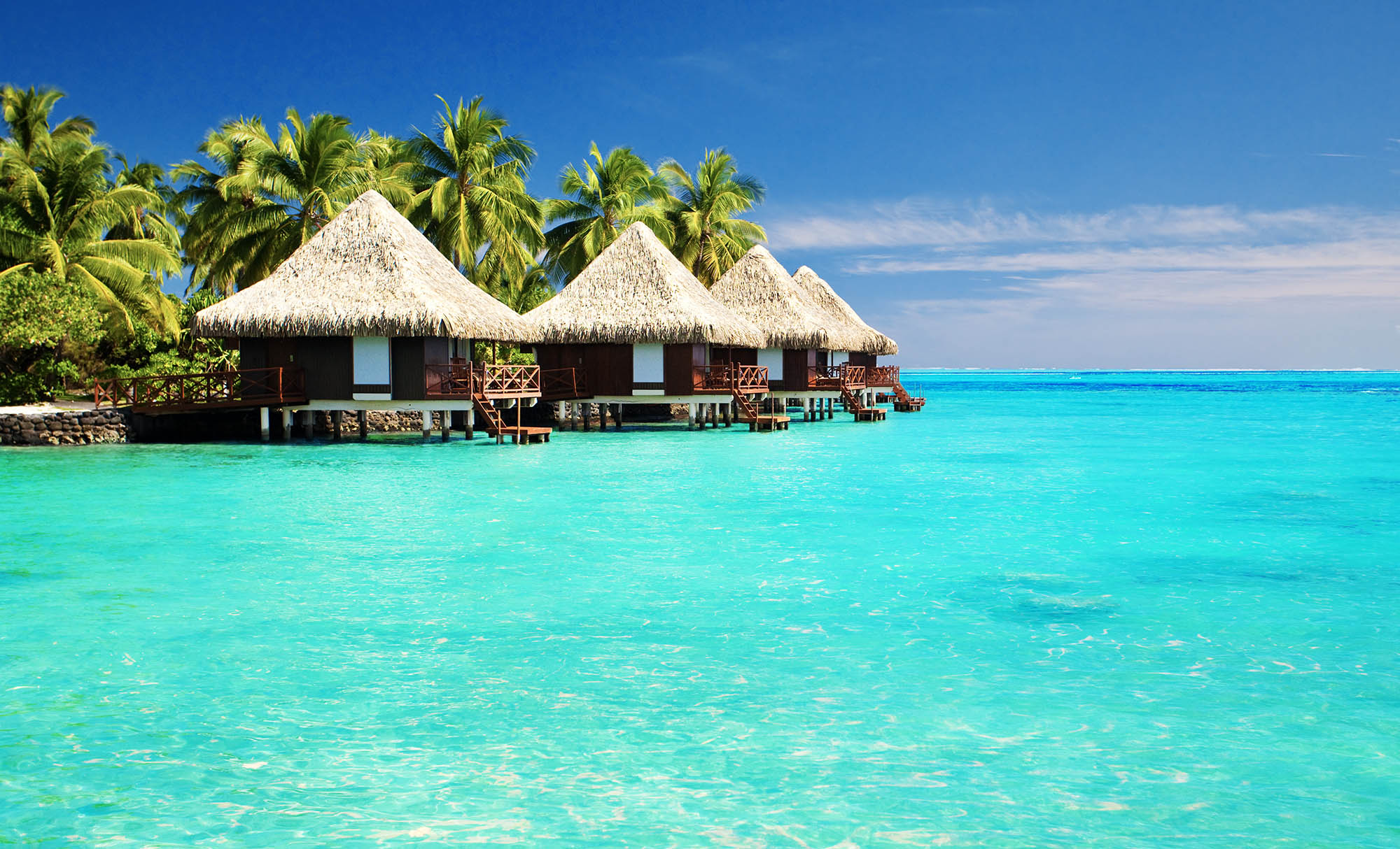 Tranquil tropical scene of cabins on The Maldives